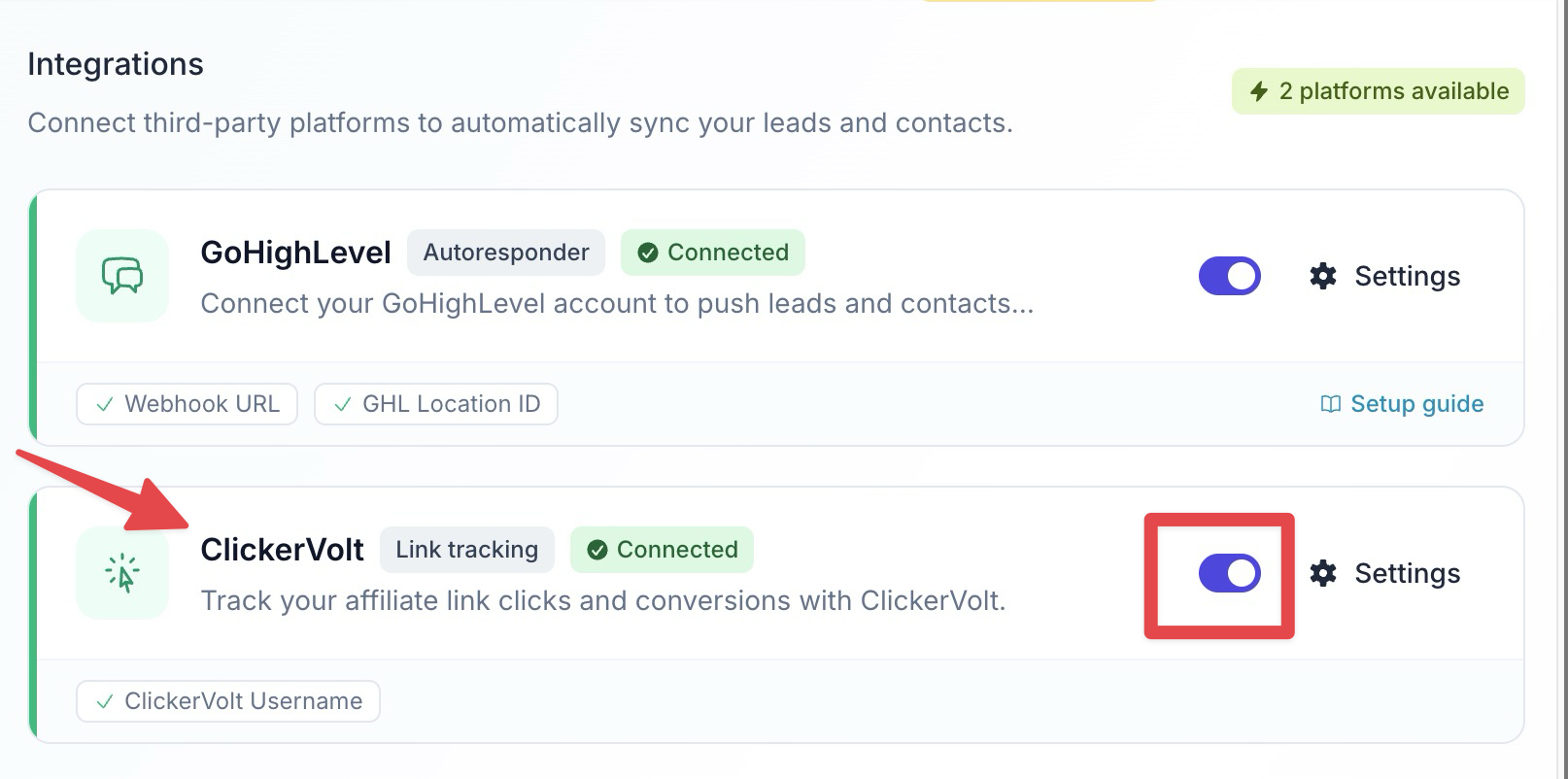 The Integrations settings page shows the ClickerVolt link tracking integration, with a red arrow pointing to the toggle switch highlighted in a red box, indicating it is currently enabled.